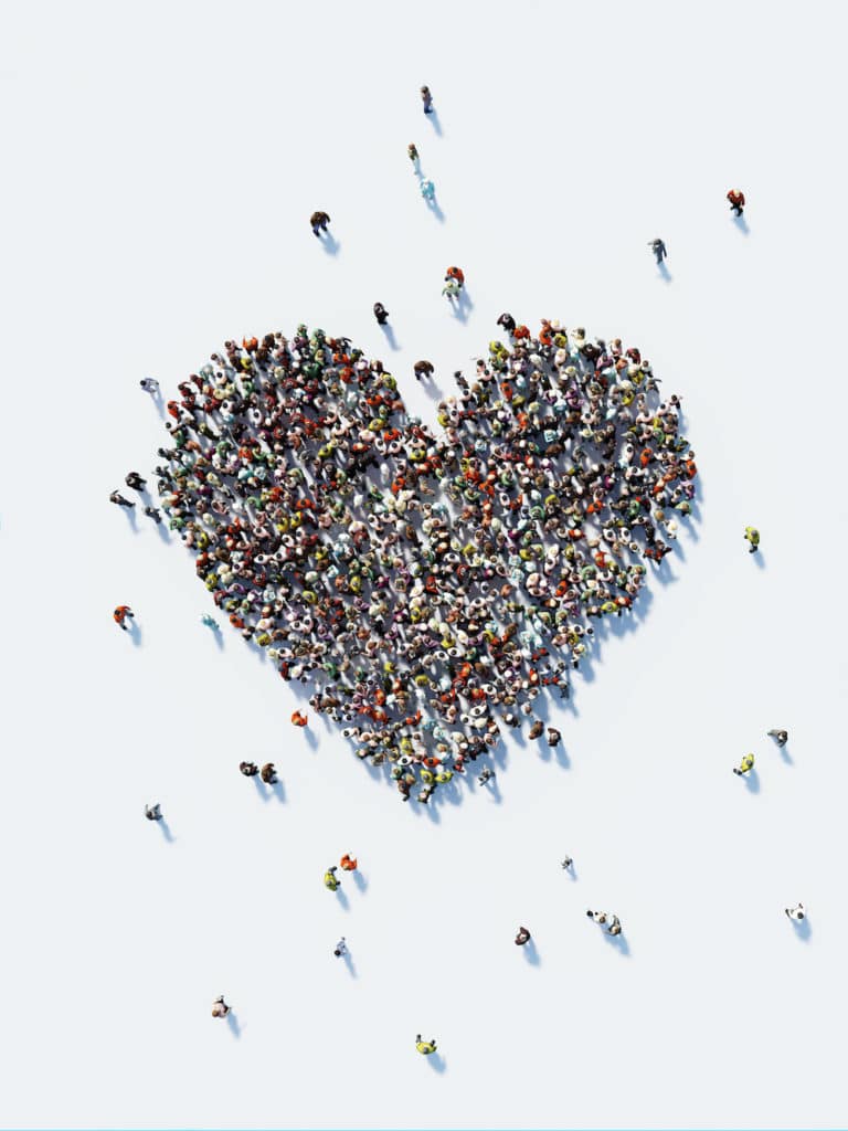 Human Crowd Forming A Big Heart Shape: Love and Donation Concept