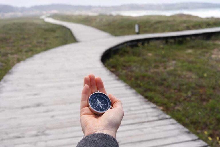 Man holding compass